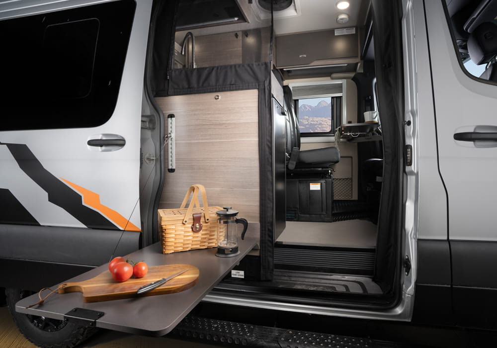 Entegra Coach Launch exterior galley at desert campsite