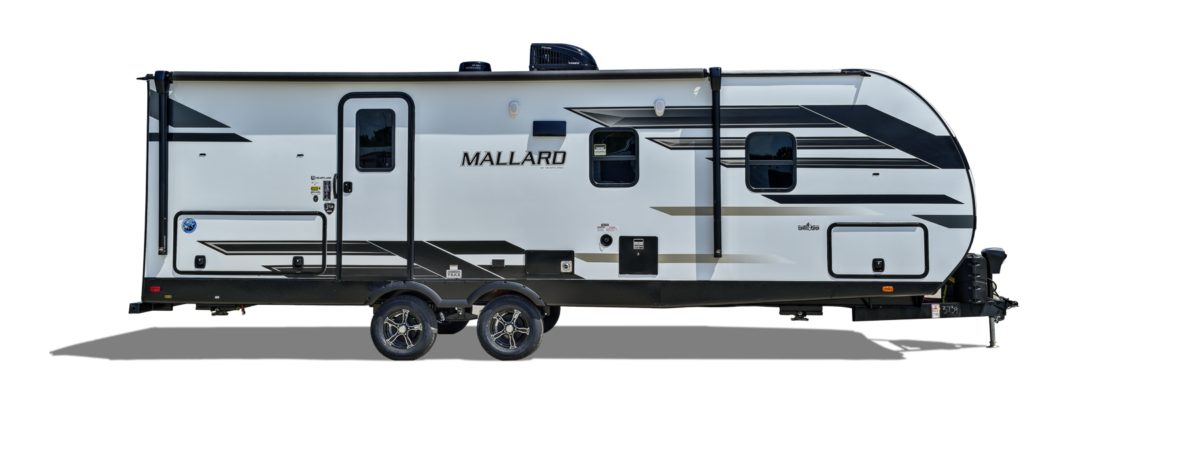 A preview of a stylish Heartland RV against a backdrop of blue sky and lush green trees.